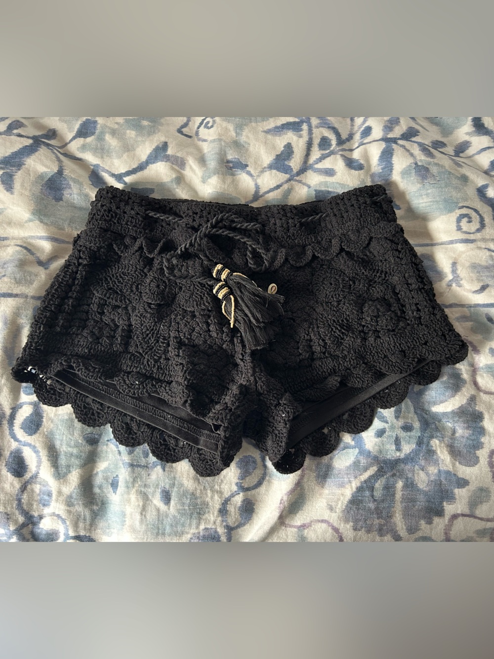 Surf gypsy boho sea shell tie embellished black knit shorts